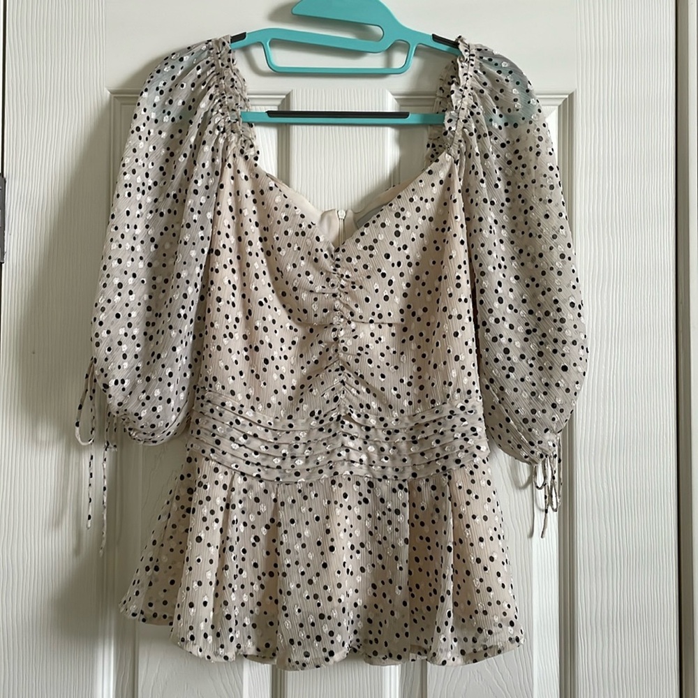 Adelyn Rae polka dot peplum blouse